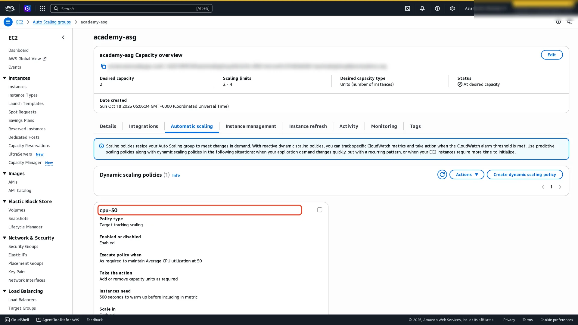 Automatic scaling tab: one dynamic scaling policy, cpu-50, type target tracking, enabled, as required to maintain average CPU utilization at 50, add or remove capacity units as required, instances need 300 seconds to warm up.