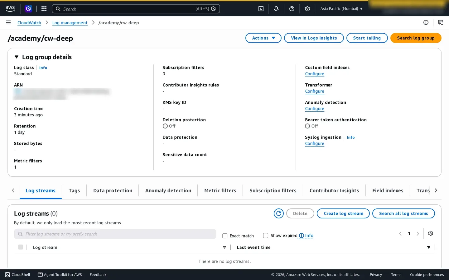 CloudWatch Logs console showing the practice log group and retention settings