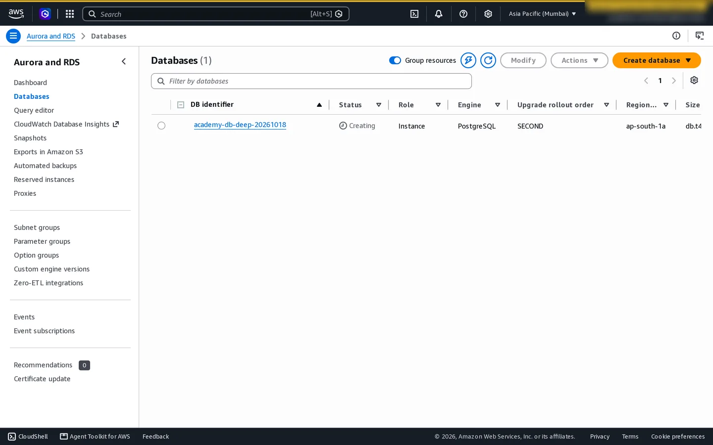 RDS database list with the temporary PostgreSQL instance and its creating state