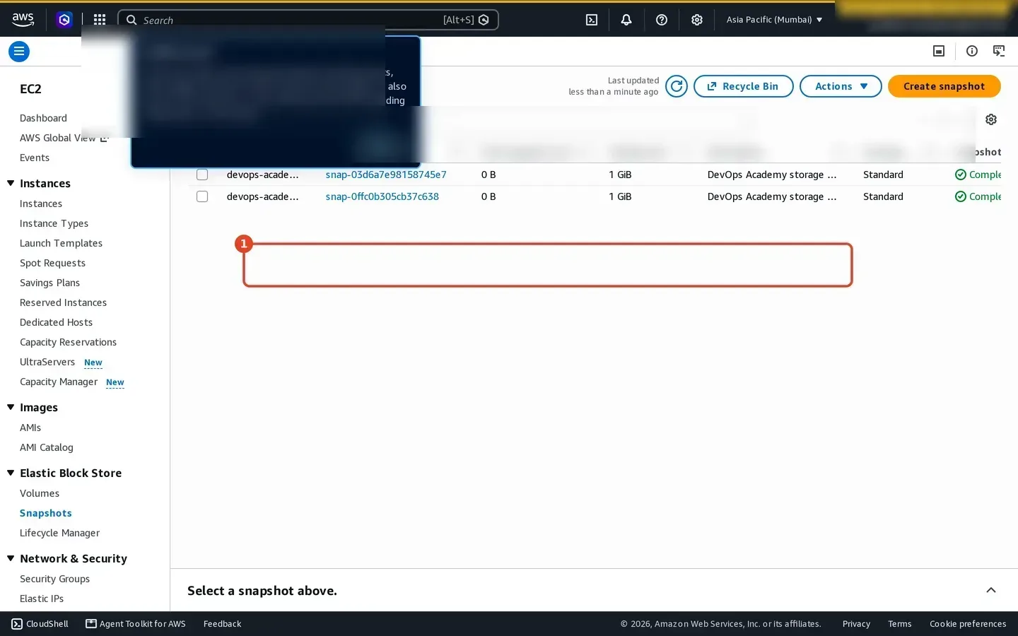 Amazon EC2 Snapshots page showing an encrypted snapshot of a one GiB volume